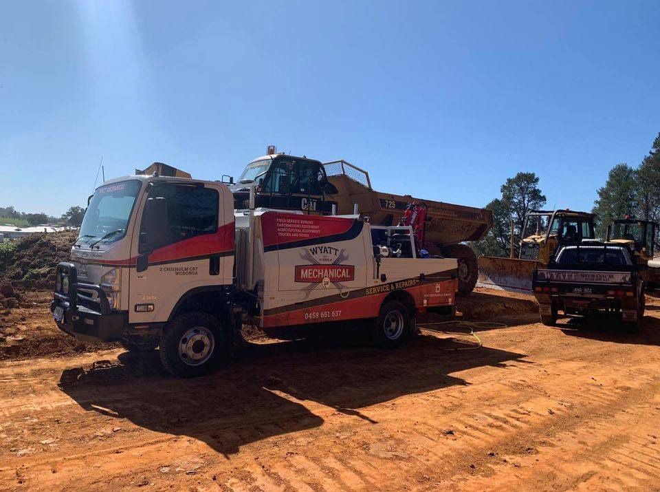 Tow Truck At A Construction Site With Heavy Machinery — Wyatt Mechanical Pty Ltd In Wodonga, VIC
