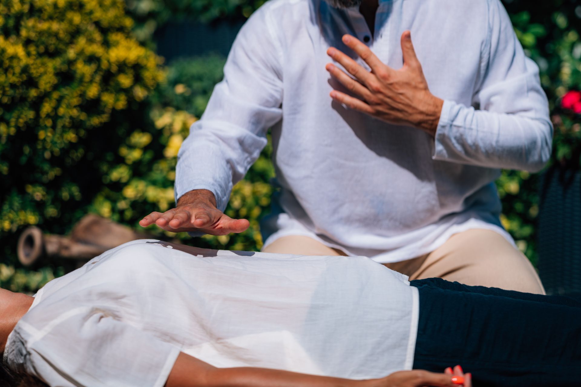 Reiki Practitioner healing his patient