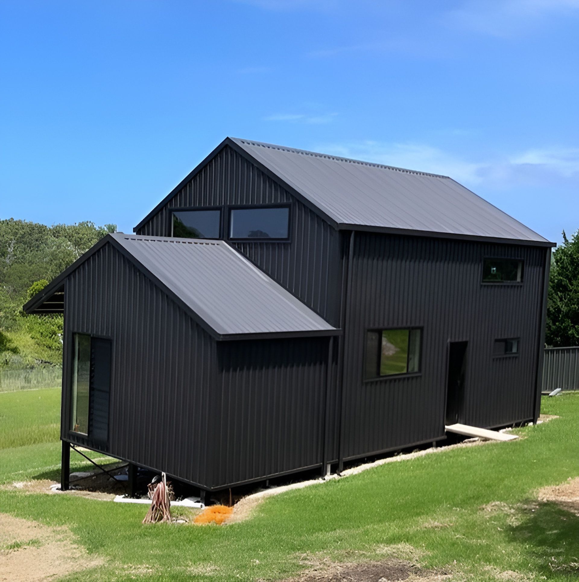 A Red Roof With a White Gutter and a Chimney — Metal Roofing by Matt Dwyer in Shellharbour, NSW