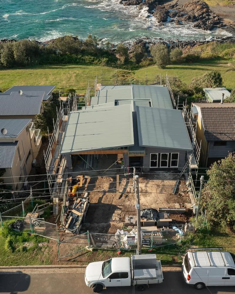 An Aerial View of a House Under Construction Near the Ocean — Metal Roofing by Matt Dwyer in Gerringong, NSW