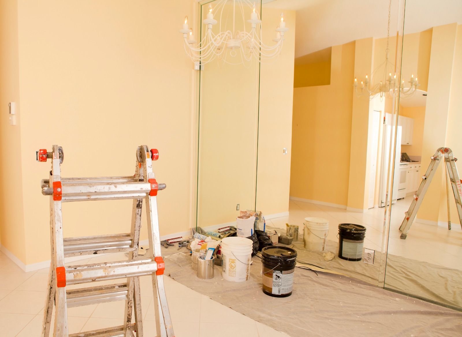 A car engine is being charged with a jump starter