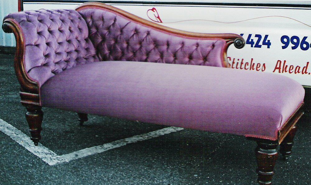 purple roll end couch