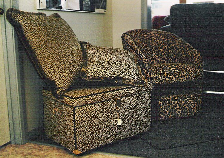 brown tub chair box and cushions