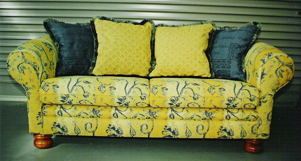 yellow settee and cushions