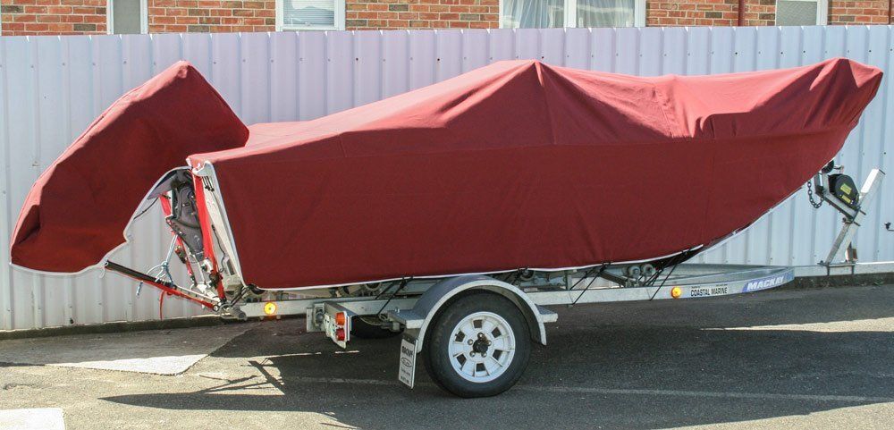 boat with red cloth cover
