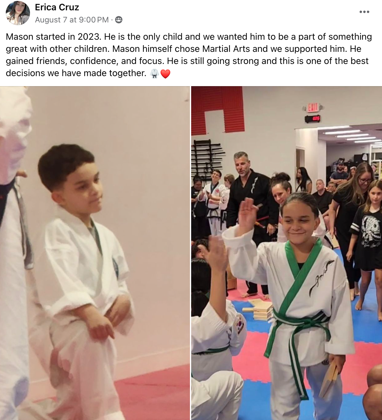 A boy and a girl are standing next to each other in karate uniforms.