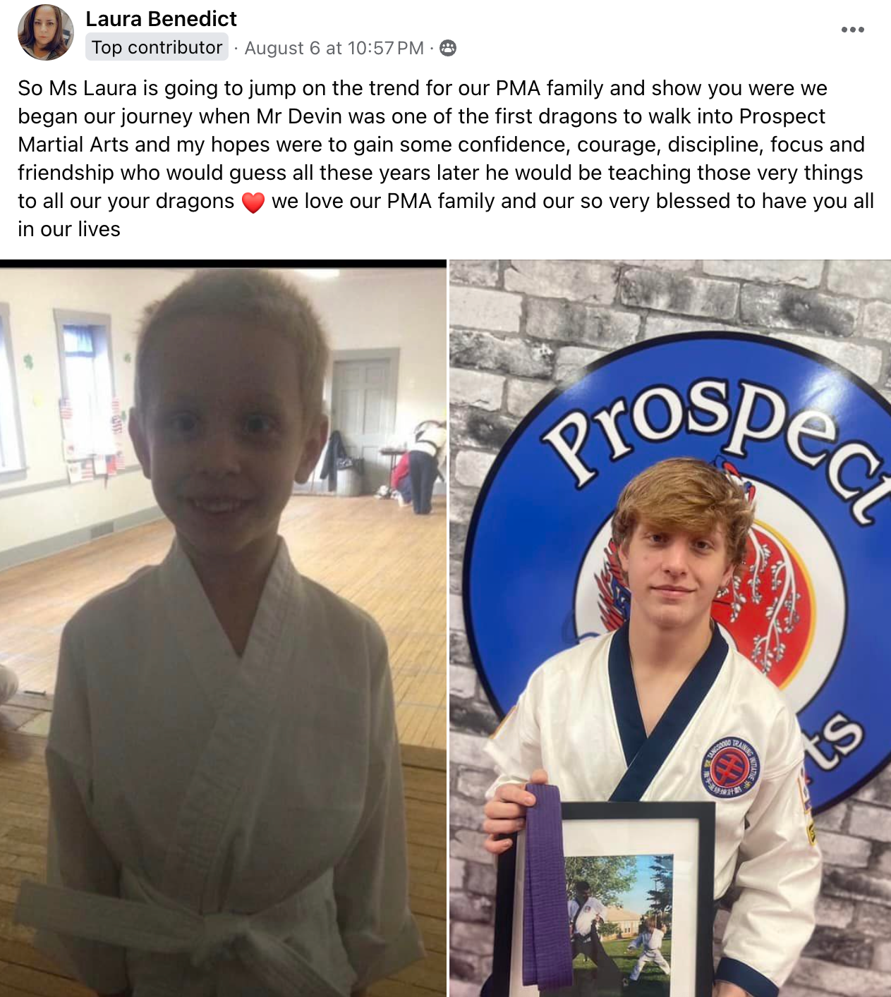 A young boy in a karate uniform is holding a framed picture.