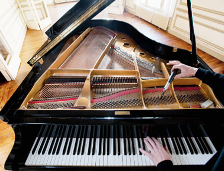 Black Piano in the Living Room — Crete, NE — Burk's Piano Service