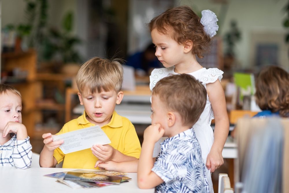 Montessori students doing an activity in a multi age montessori classroom