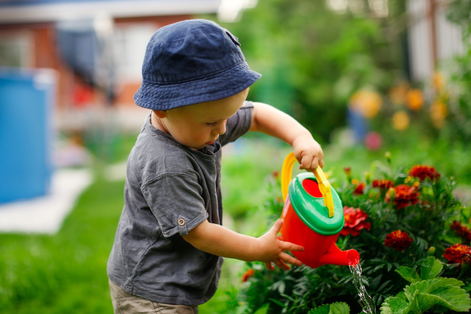 A little boy doing a montessori activity.