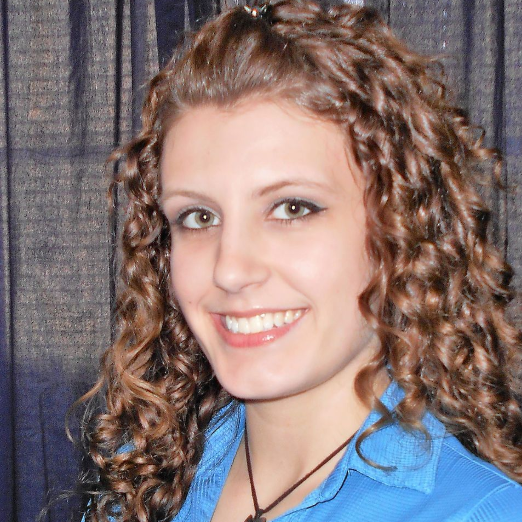 Silhouette of a person with a round head and body.