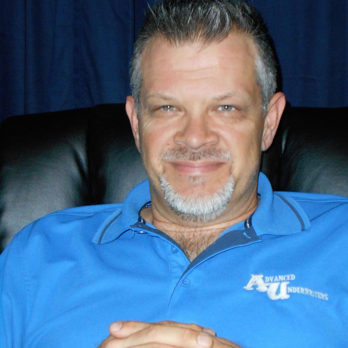 Gray silhouette of a person with a white circle representing the head.