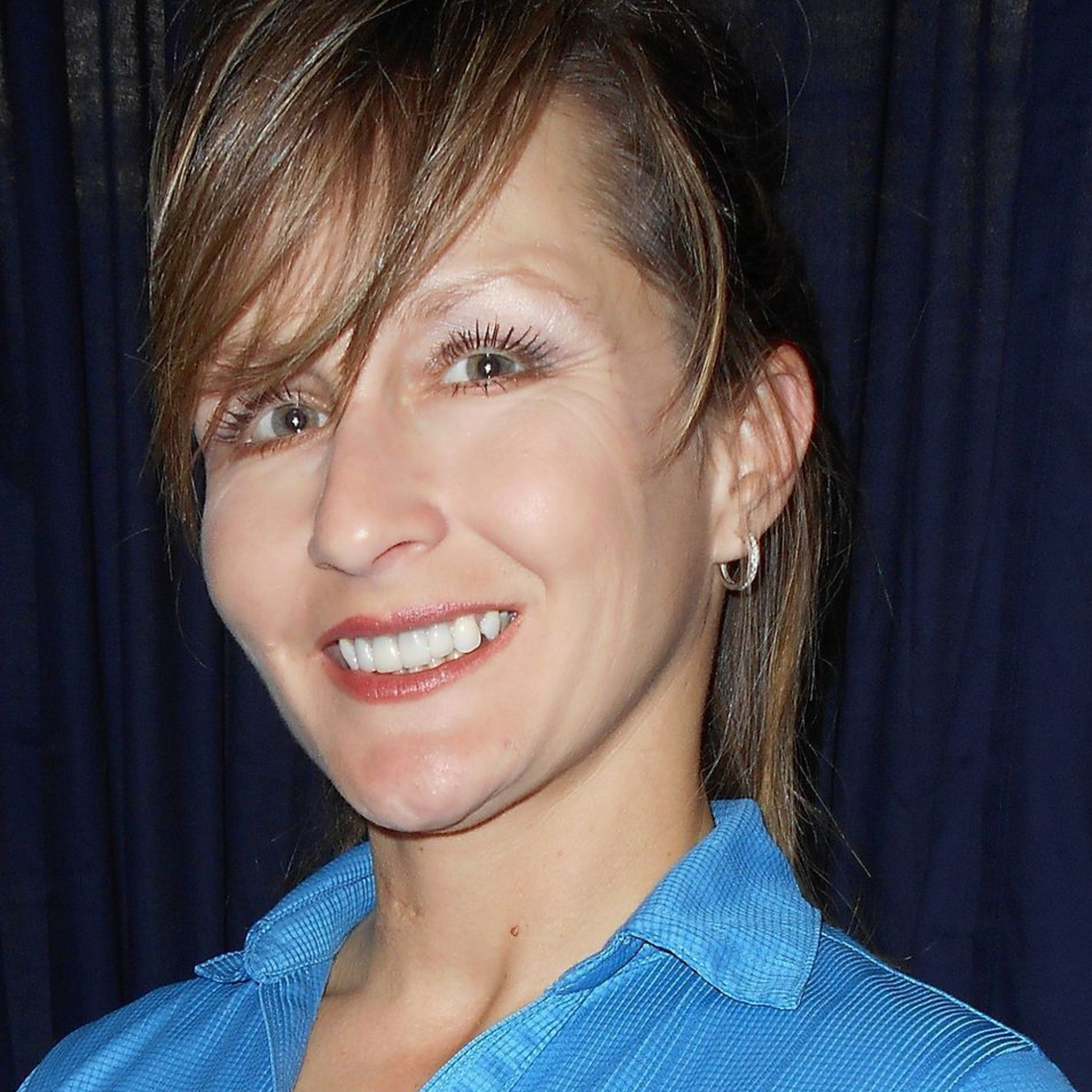 Gray silhouette of a person, head and torso with a white circle for the face.