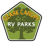 Pentagon-shaped logo with a green tree silhouette, yellow 