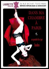 una donna in lingerie fa una verticale su una sedia rossa.