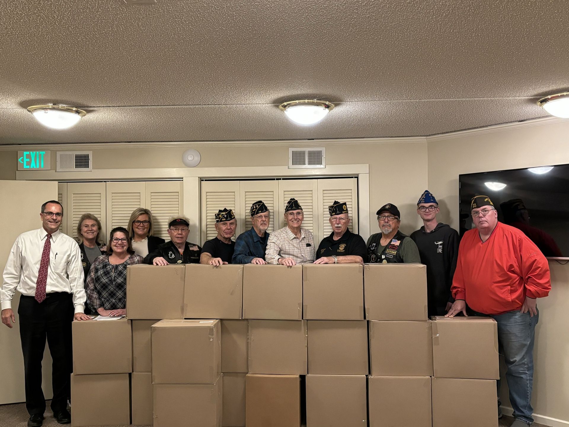 Pictured Left to Right:  Jon Zwick (Zwick & Jahn); Lisa Crump (American Legion Post 43 Riders); Jen Toledo (President American Legion Post #468 Auxiliary); Jaime Beitler (Zwick & Jahn); Don Evans (American Legion Post 43 Riders); Art Booth (American Legion Post 468); Carl Stevens (American Legion Post 43); Bruce Reidenbach (American Legion Post 43); Dennis Friday (American Legion Post 468); Jesse Mendez (American Legion Post 43 Riders); Peyton Wagner (VFW Post 6751 Auxiliary); Les Wagner (V.F.W. Post 6751)