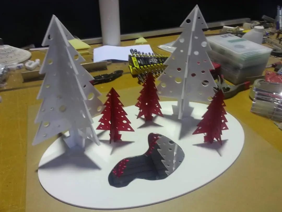 A Christmas Scene With Trees and a Sock on a Table — Coastal Plastics In Tweed Heads South, NSW