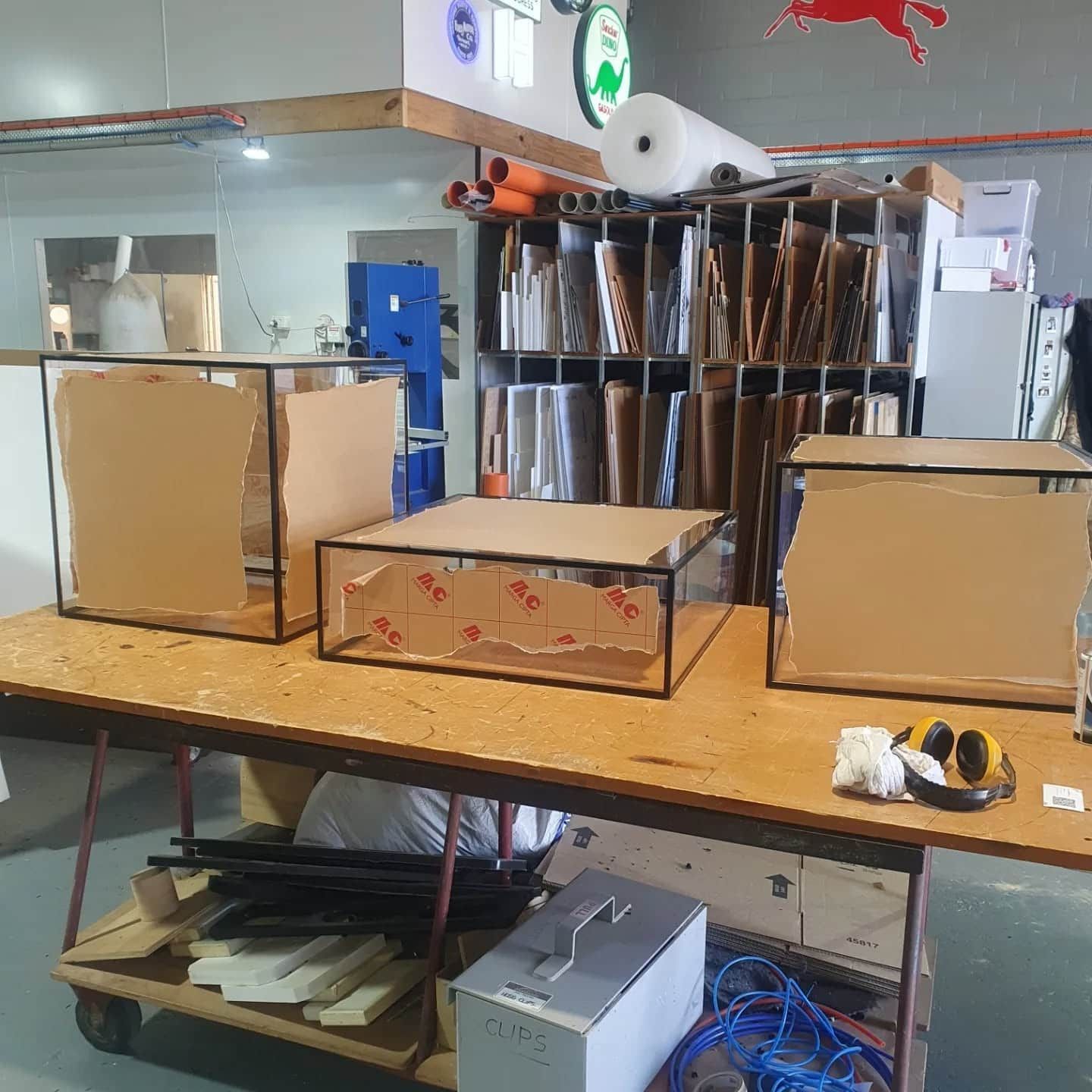 A Table With a Bunch of Boxes on It — Coastal Plastics In Tweed Heads South, NSW
