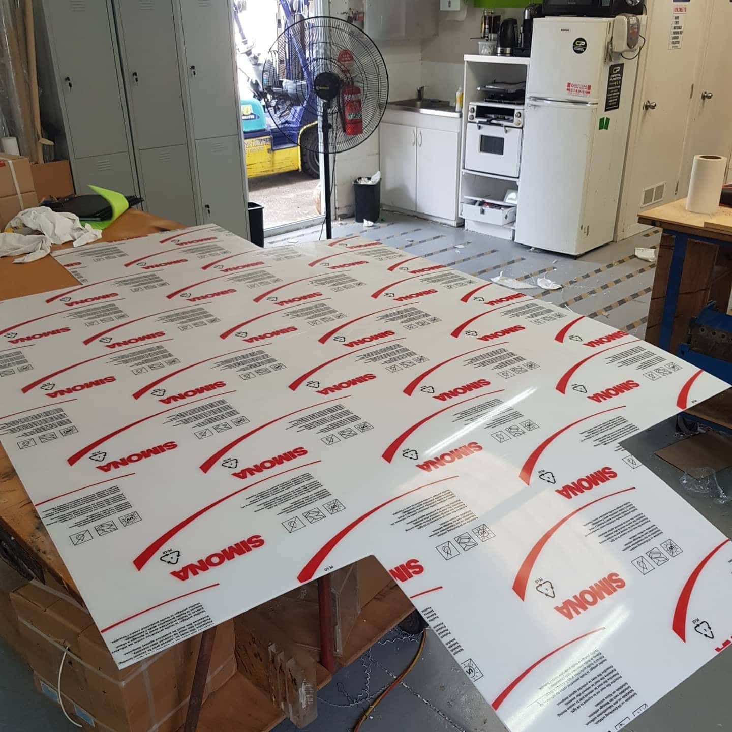A Large Piece of Simona Acrylic is on a Table in a Kitchen — Coastal Plastics In Tweed Heads South, NSW