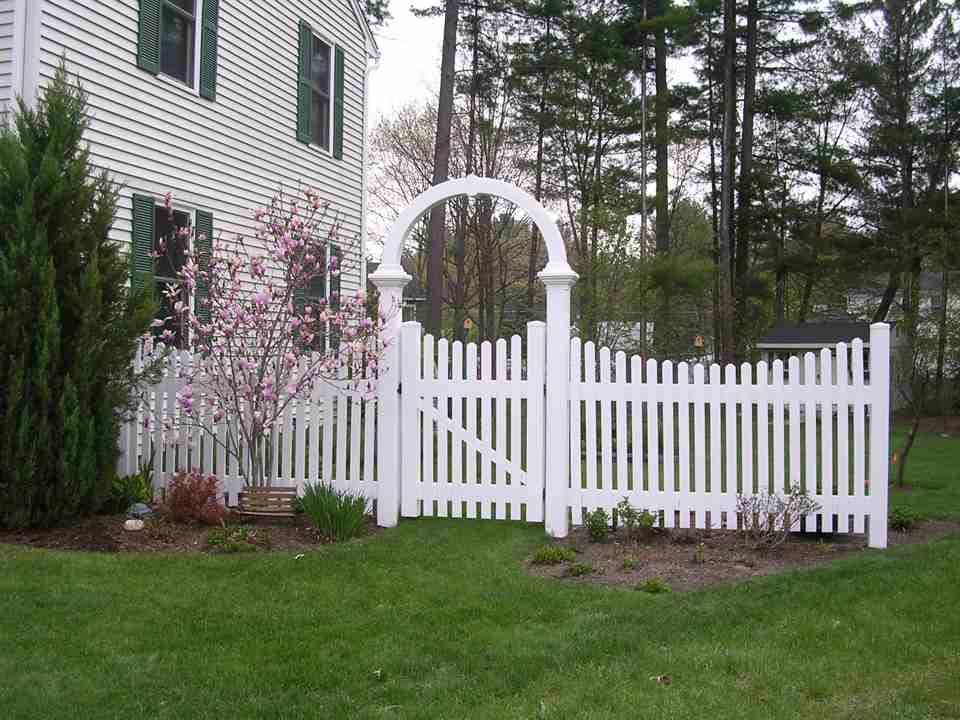 White Wooden Fence with Arbor — Barrington, NH — 125 Maintenance & Fence Inc