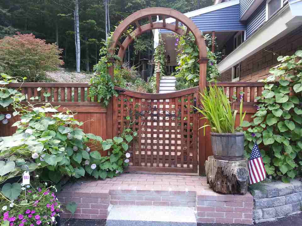 Arbor with Plants — Barrington, NH — 125 Maintenance & Fence Inc