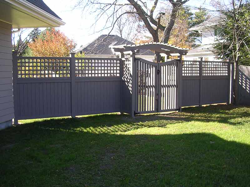 House's Fence with Arbor and Gate — Barrington, NH — 125 Maintenance & Fence Inc