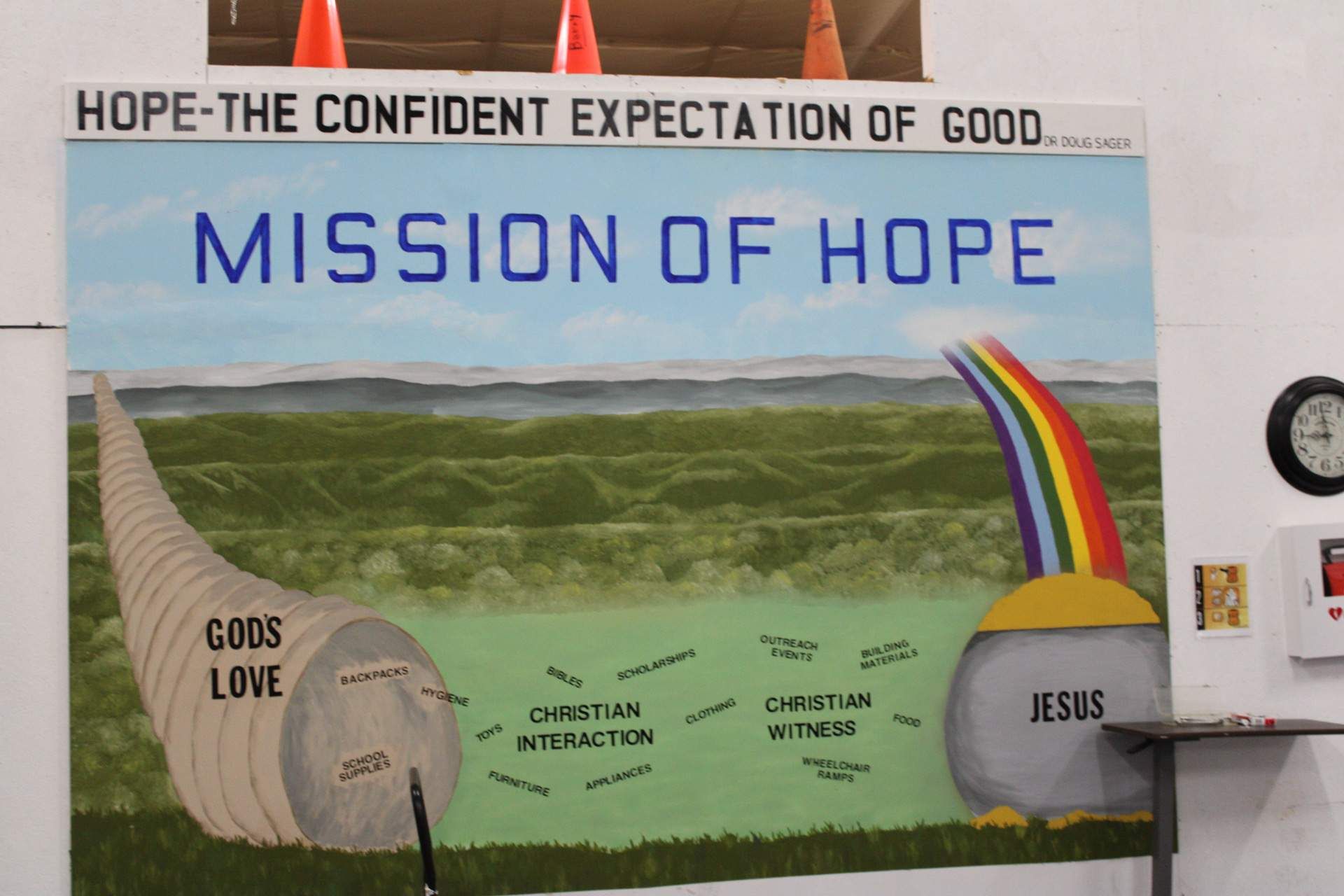 A painting on a wall that says mission of hope