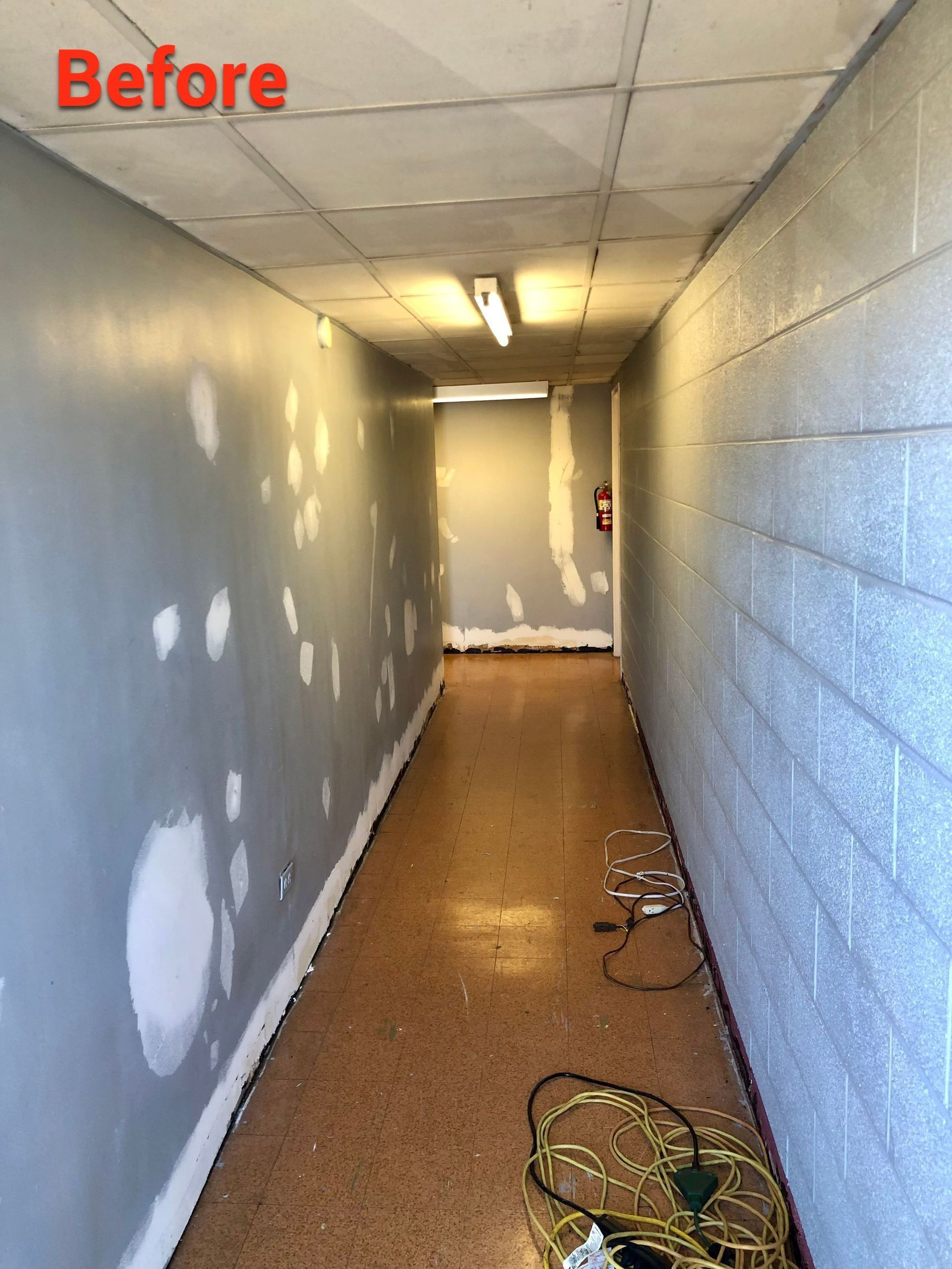 A picture of a hallway before being painted
