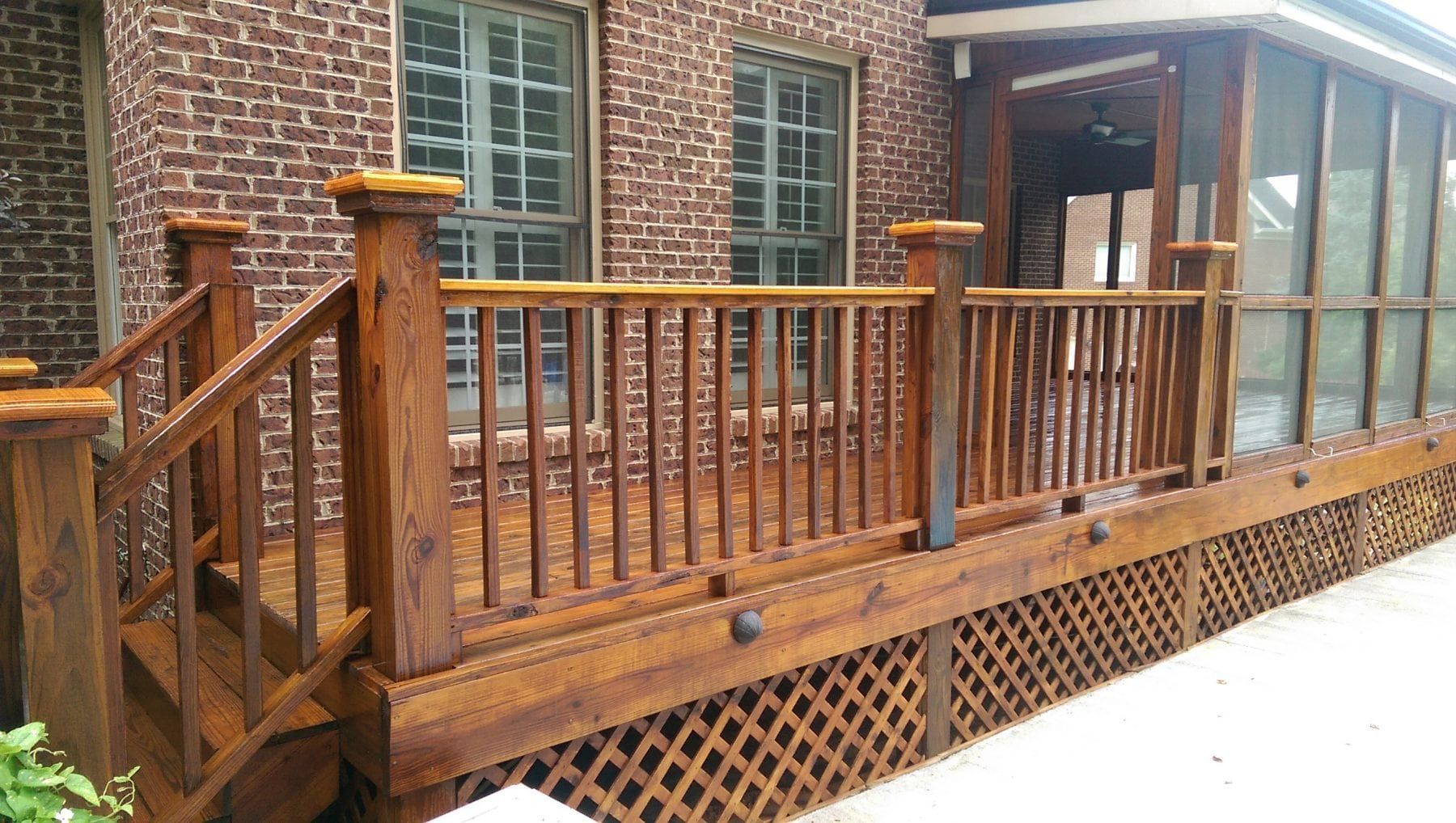 McLains deck porch and fence staining