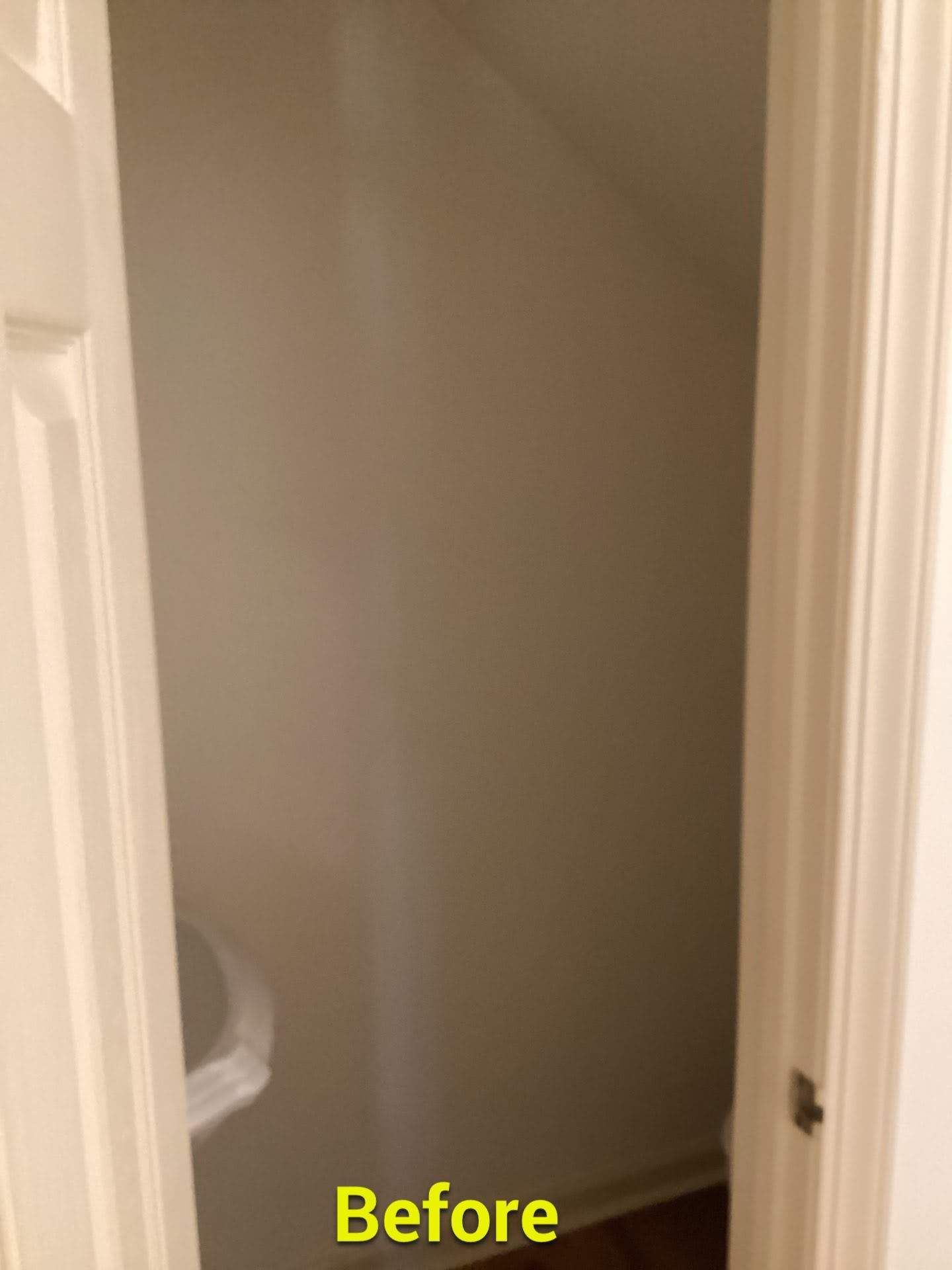 A before picture of a bathroom with a sink and a toilet.