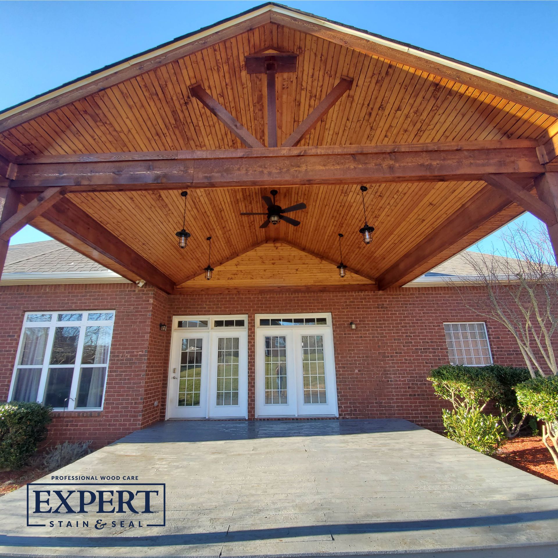 A brick building with a wooden roof and a sign that says expert