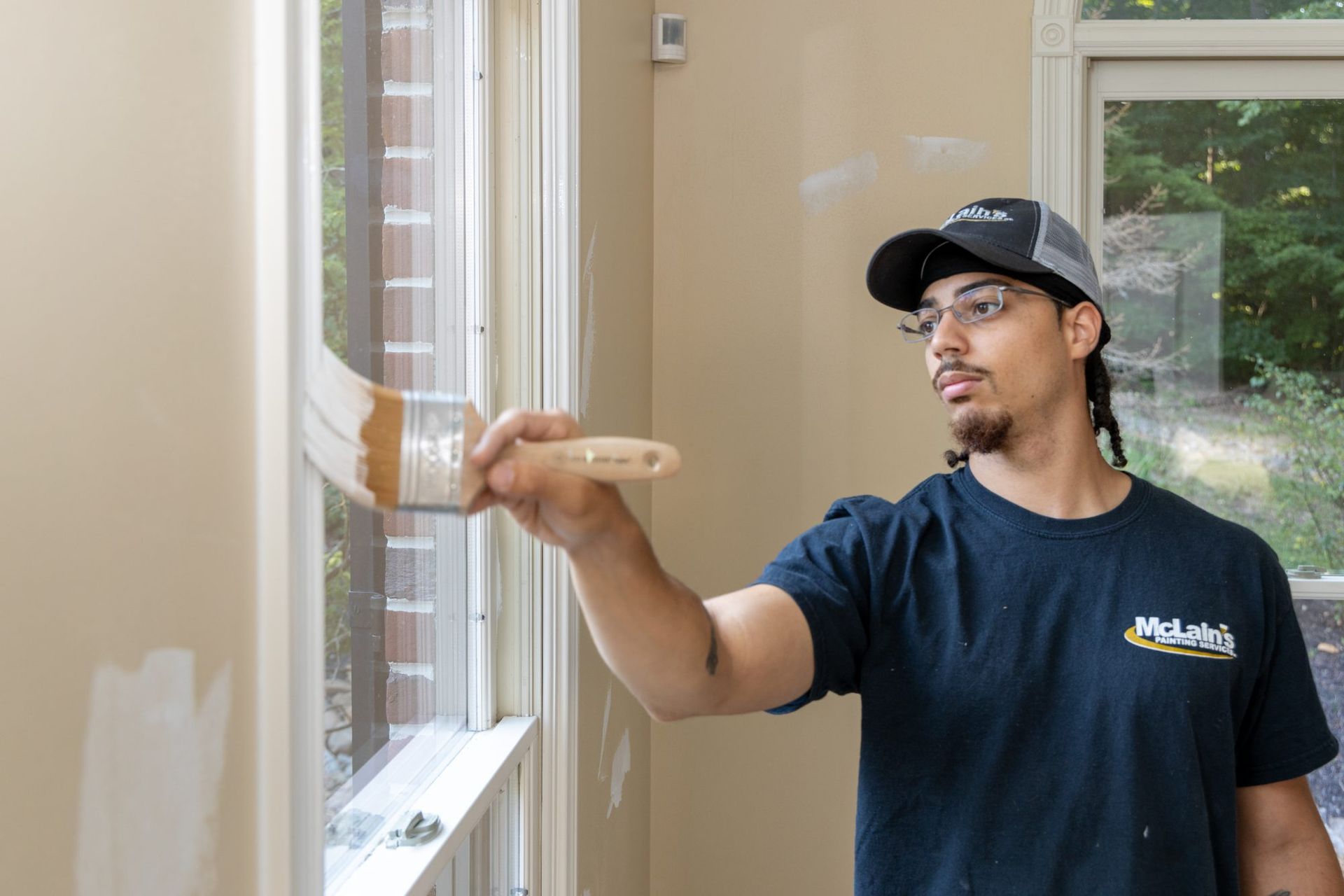 McLains employee paints home interior trim