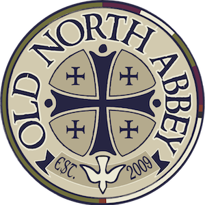 An old north abbey logo with a cross and dove