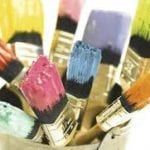 paint brushes with multi colored paint on brushes