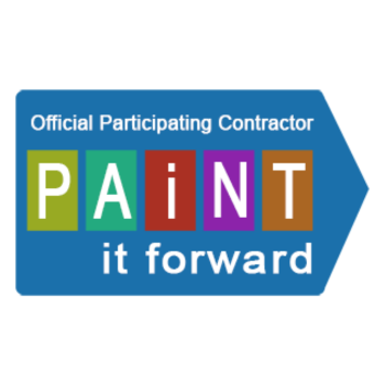 A blue sign that says official participating contractor paint it forward