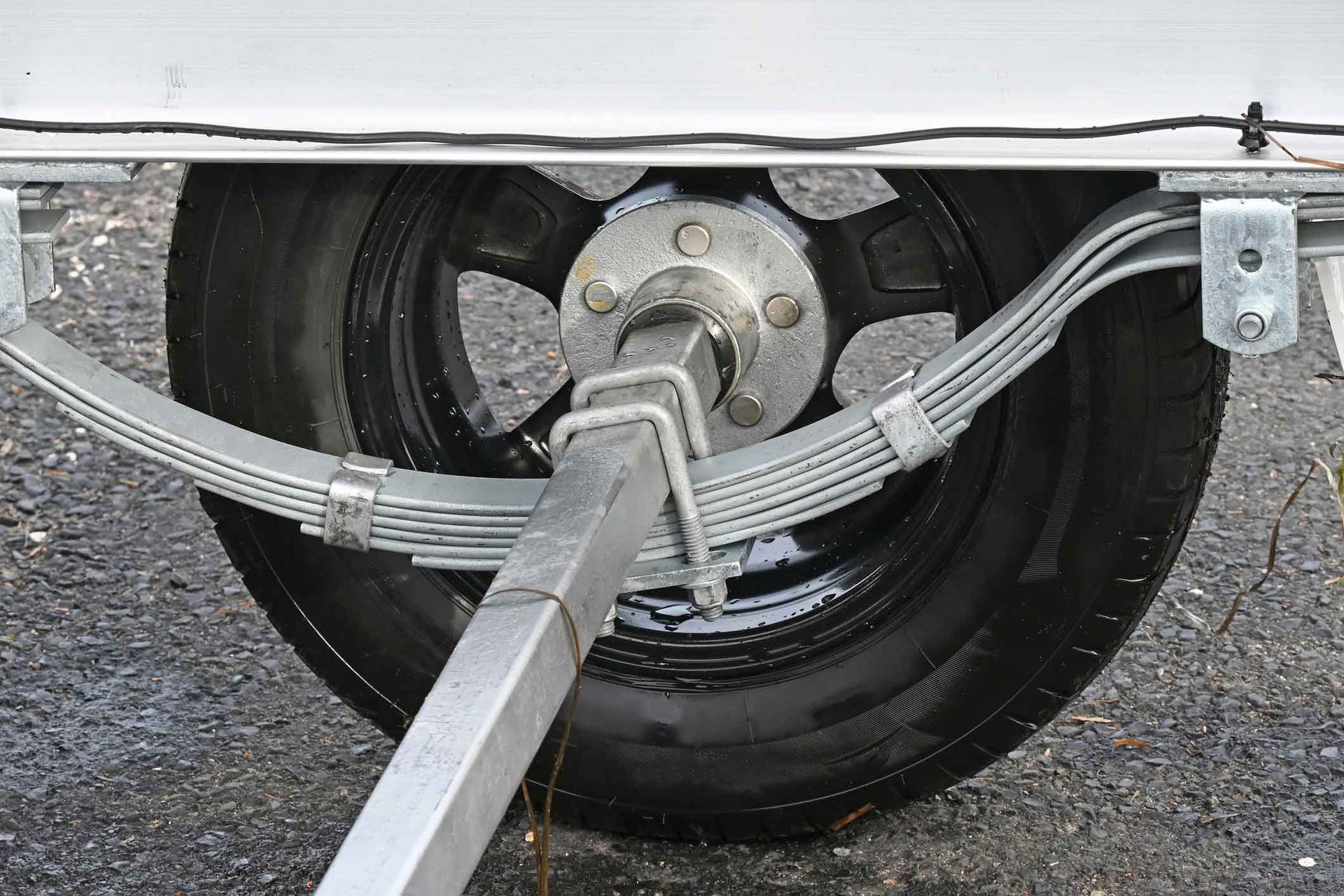A Close Up Of A Trailer Wheel With A Leaf Spring Attached To It – North Geelong, VIC - F Sparks & Sons