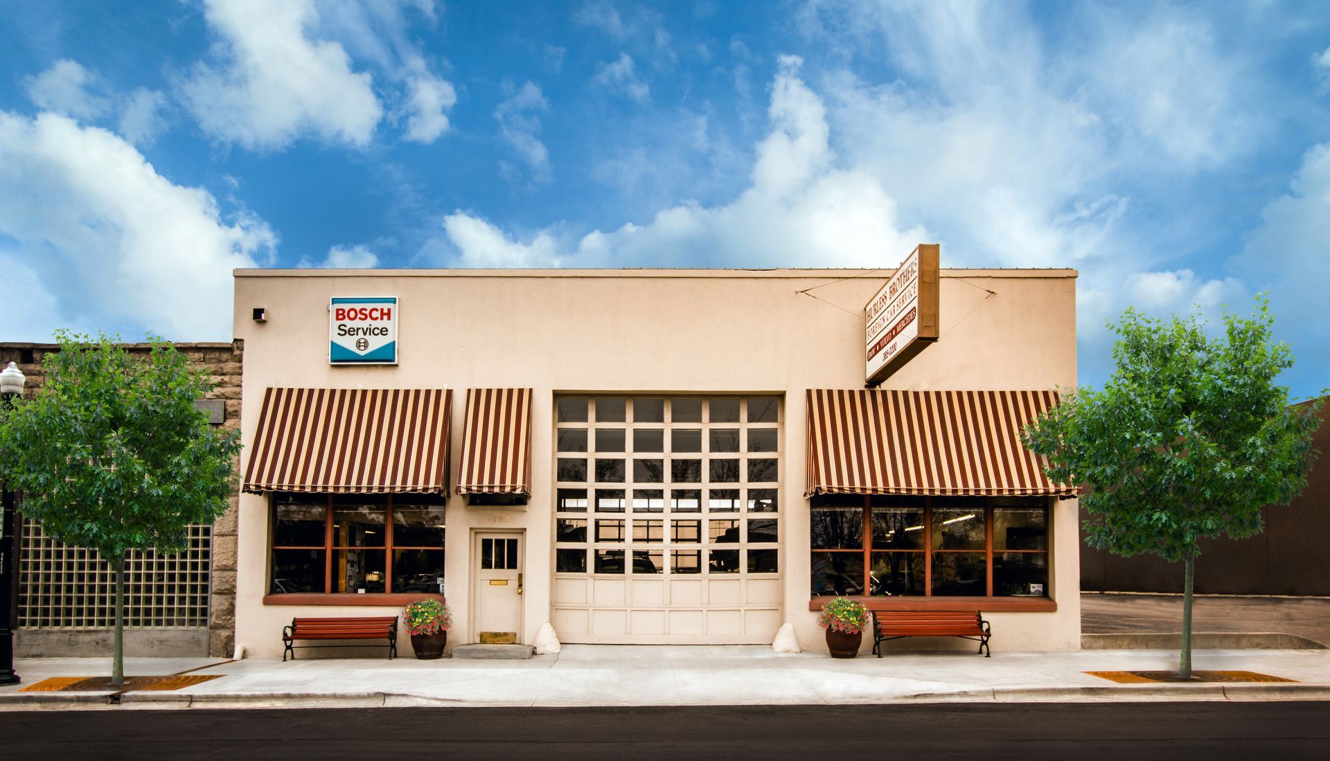 A building with a sign that says ' coca cola ' on it
