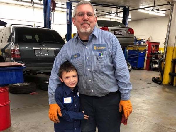 Our Mechanic with Kid in Rockville, MD - Golden Gears Automotive Inc