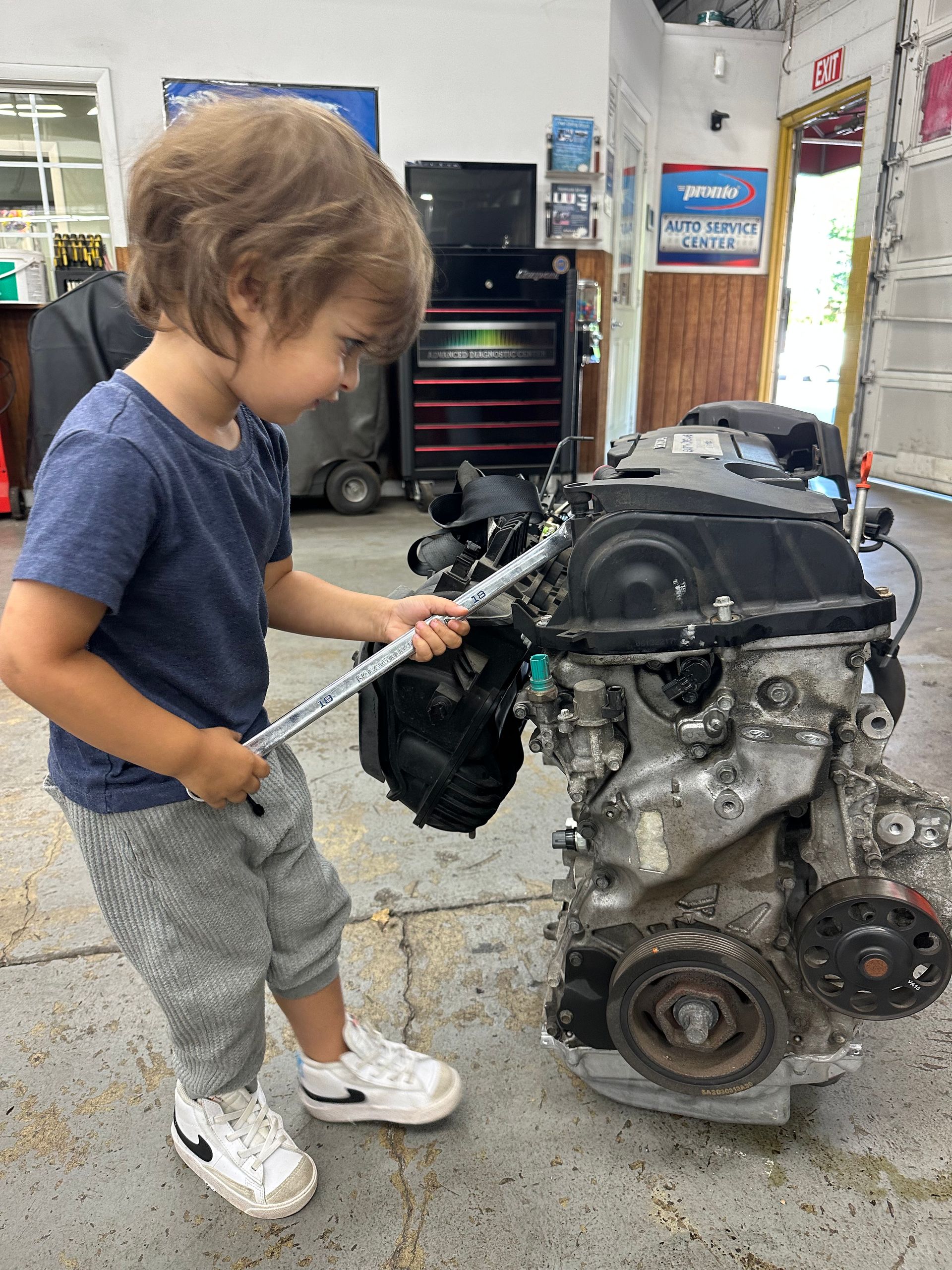 Kid Inspect Engine at Golden Gears Automotive Inc - Rockville Auto Repair