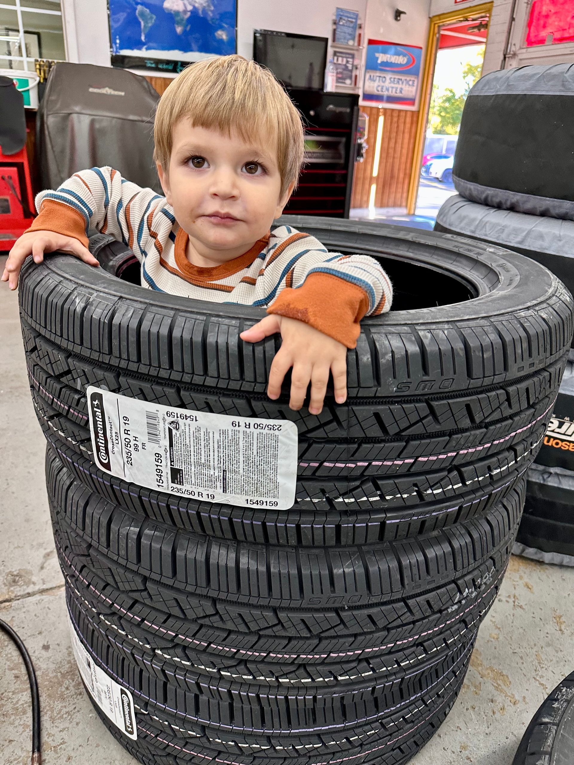 Kid Inside Tires - Golden Gears Automotive Inc