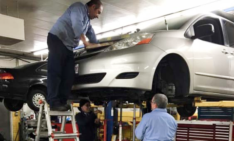 Mechanics Inspects Vehicle at Golden Gears Automotive Inc - Rockville Auto Repair