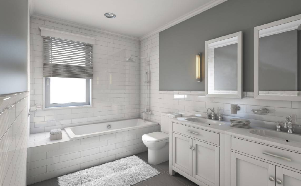 Bathroom with white tiled walls, a bathtub, and a double vanity. Gray accent wall and window.