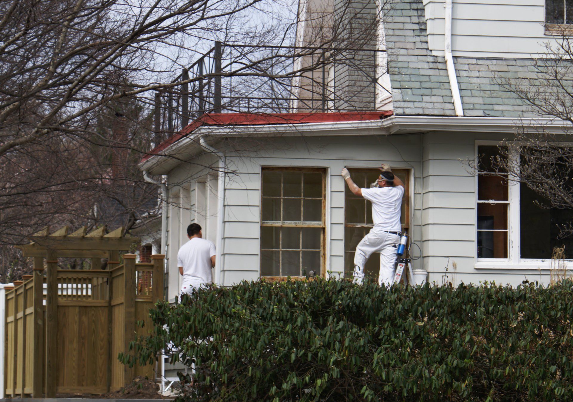 Installation Of Siding — Two Men Installing A Siding in OH, US