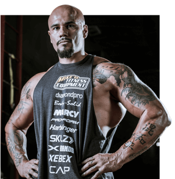 A man is wearing a tank top that says diamondpro on it