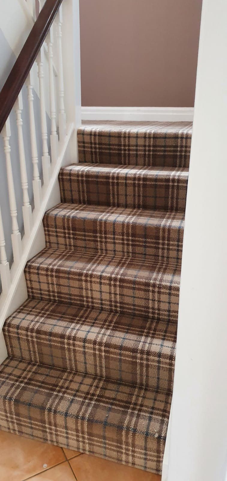 Warm tartan stair carpet