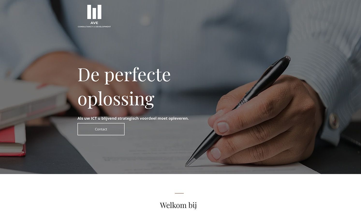 A person is writing on a piece of paper with a pen.