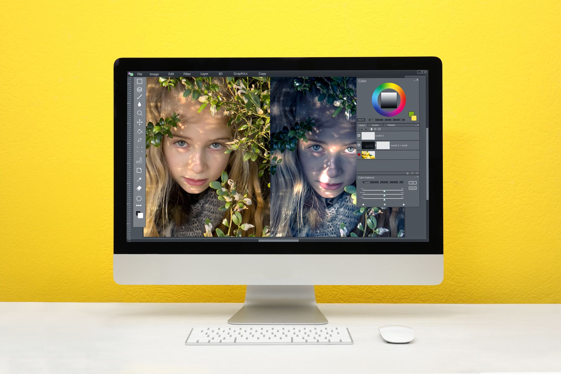 a computer with a picture of a girl on the screen