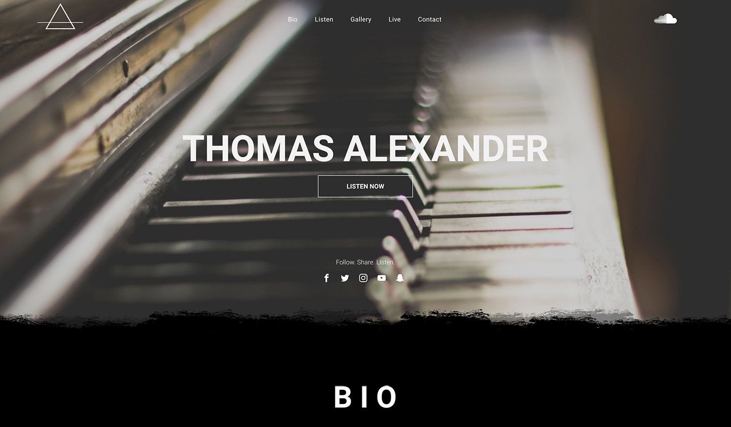 A close up of a piano keyboard with the name thomas alexander on it