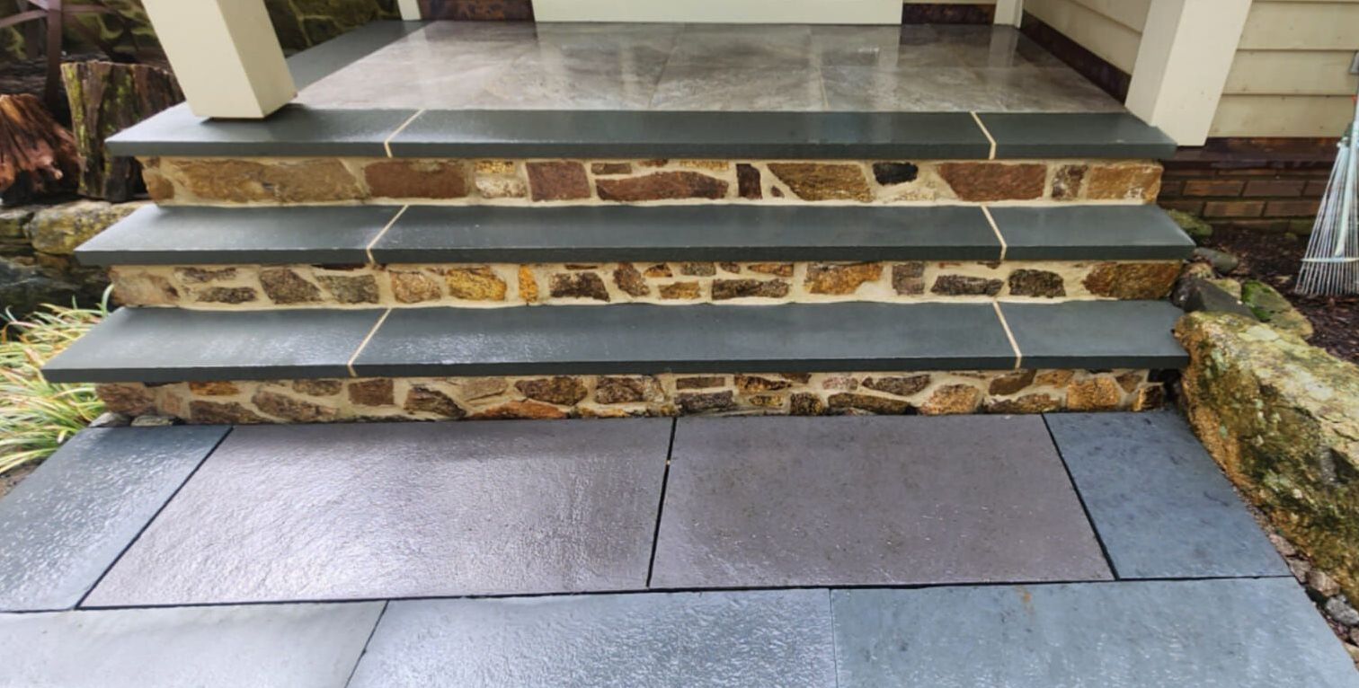 Power washing a house