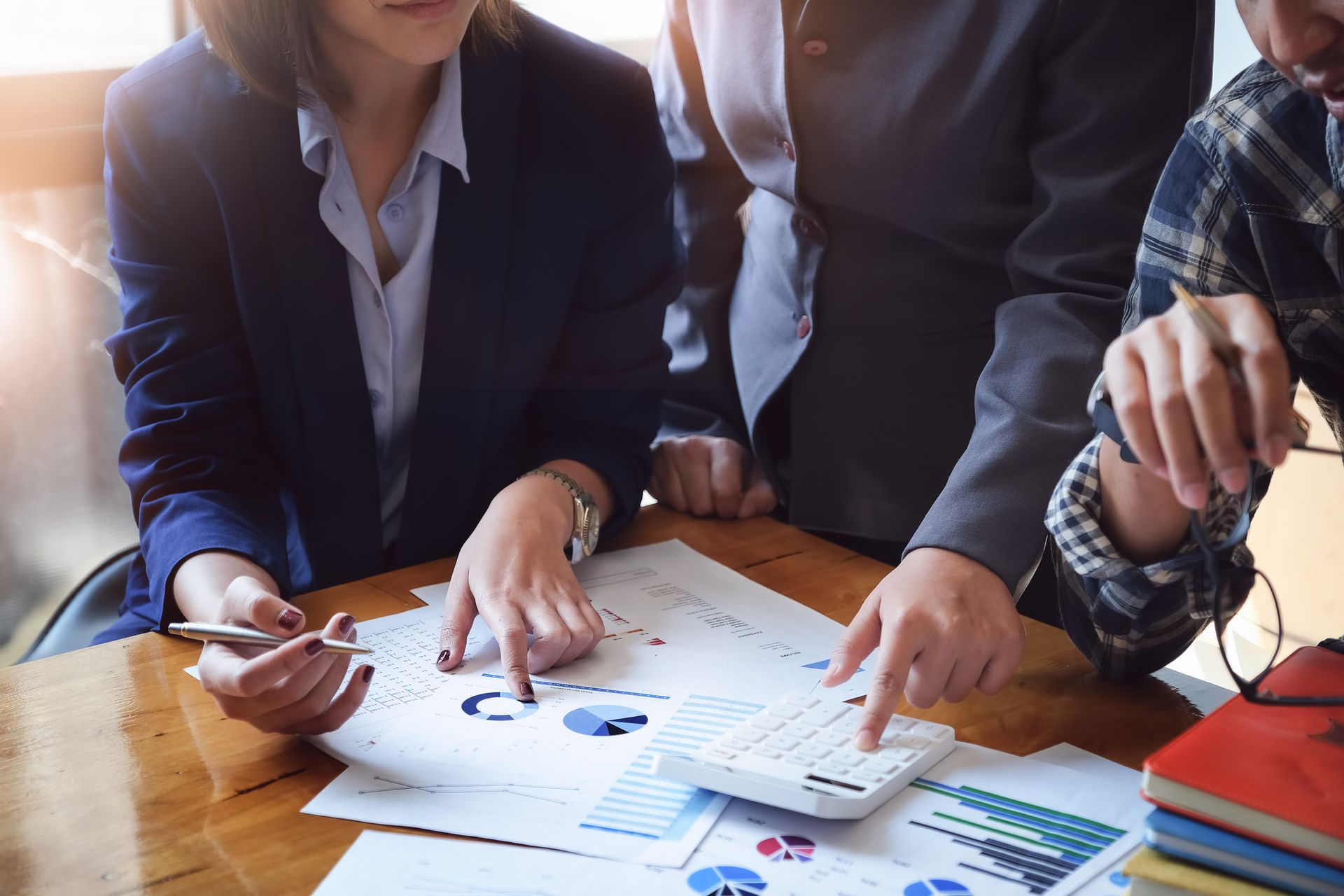 Group Of People Analyzing Thr Graph – Allen, TX – Keep It Simple Tax Services